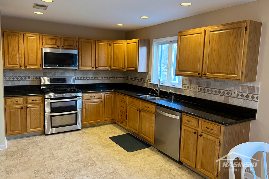 Mercer County Kitchen with Dark Wood Cabinetry Before Remodel Photo Angle 1